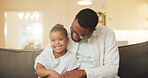 Happy, hug and child with father on sofa in home for bonding, love and connection on weekend. Smile, relax and African girl kid with dad in living room for care, safety or trust together in house.