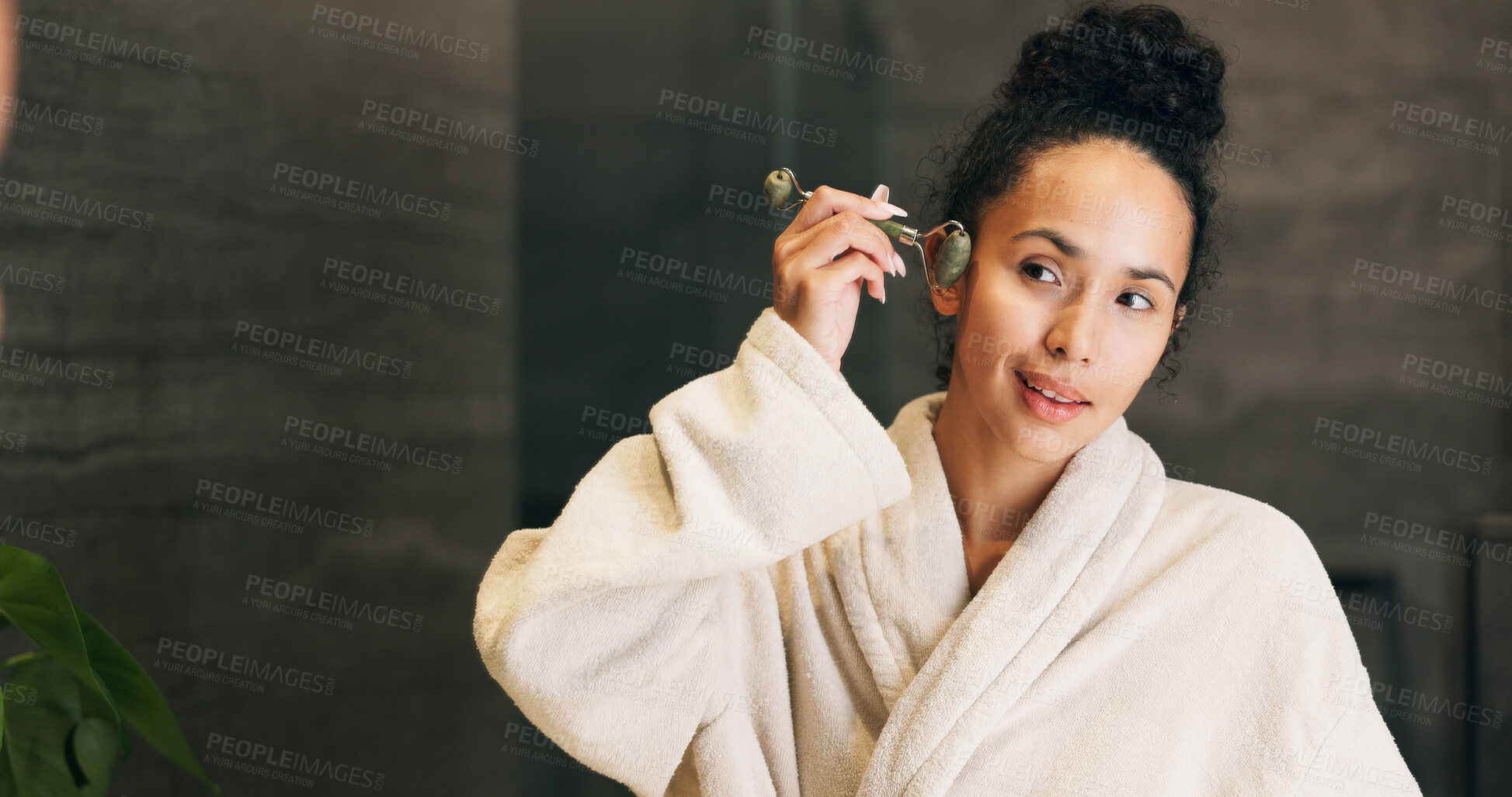Buy stock photo Woman, skincare and jade roller in bathroom with mirror, lymphatic drainage and beauty cosmetics. Space, person and product in home with facial massage, reflection and blood circulation benefits.