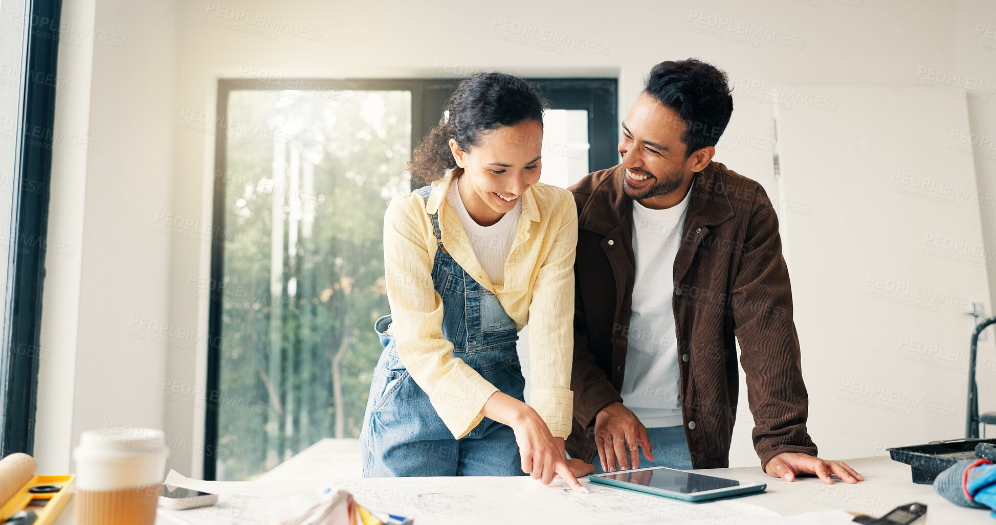 Buy stock photo Planning, happy and couple in home for renovation, interior design and decoration for new house. Marriage, talking and man with woman with documents for improvement, remodeling or diy project on tech