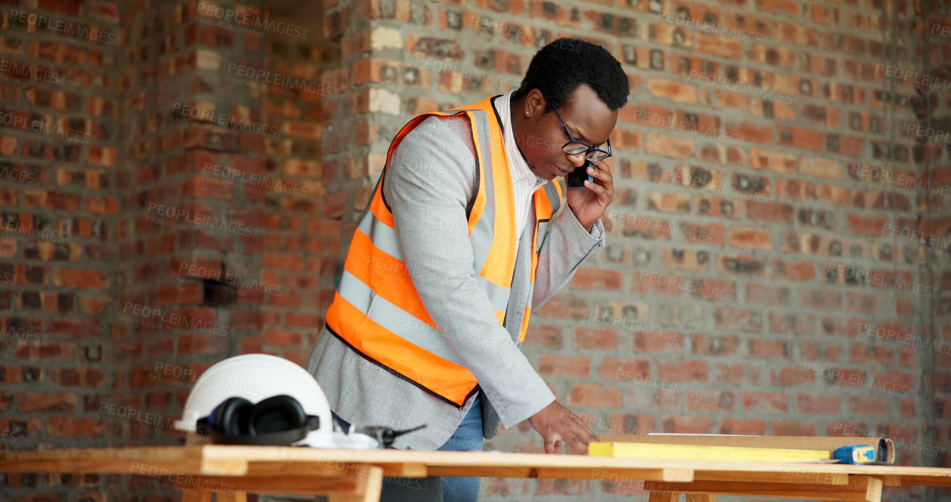 Buy stock photo Architect, blueprint or man with phone call for construction, confirm design or project update. Architecture, black person and floor plan with mobile talk for status reporting, feedback and site chat