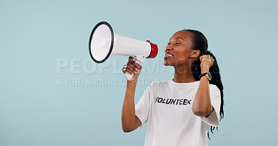 Buy stock photo Volunteer, megaphone and black woman in studio for awareness campaign on a blue background. Happy person, space or activist talking with bullhorn speaker for alert, announcement or charity donation