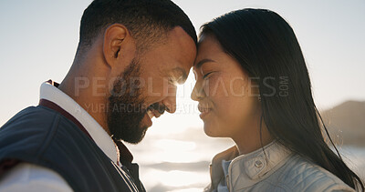 Buy stock photo Outdoor, couple and forehead touch for love, trust or romantic connection on summer vacation. Man, woman and bonding with happy partner in nature, interracial relationship and sunshine on holiday