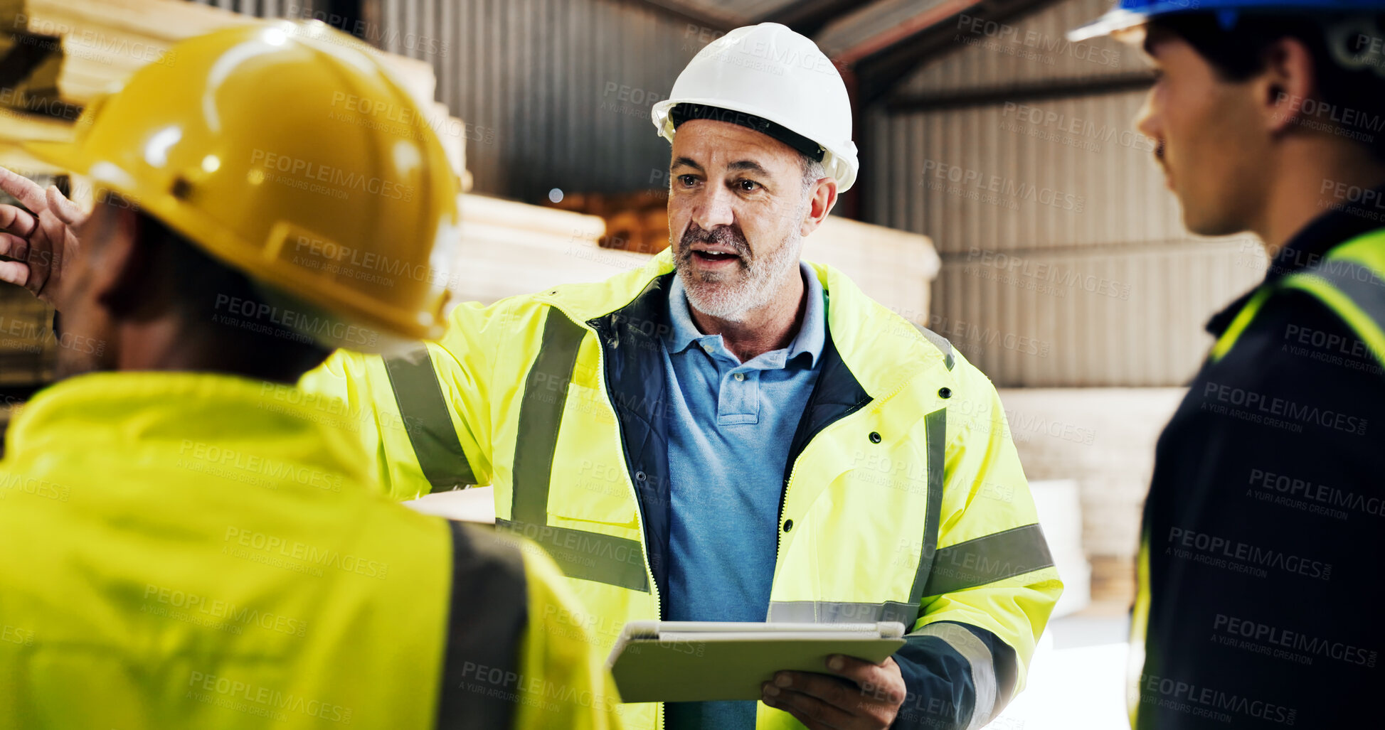 Buy stock photo Carpenter, discussion and men with tablet in workshop, teamwork or planning for furniture production. Woodworking, collaboration and mature person with technology, talking and manufacturing project