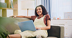 Relax, girl and laugh with laptop on sofa for comedy movie, streaming subscription and weekend break. Happy, woman and tech in home for watching funny series, comic video and internet entertainment