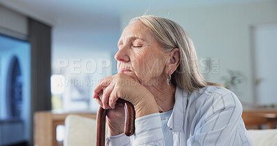 Buy stock photo Old woman, sleeping or thinking with cane in retirement facility, mental health and eyes closed from fatigue. Person with disability, pensioner and walking stick with past perspective, tired or nap