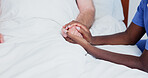 Senior, nurse and holding hands with patient in bed for empathy, understanding or comfort. Elderly, caregiver or touch with healthcare worker in bedroom for sympathy, help or support in nursing home