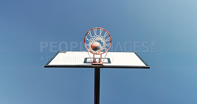 Buy stock photo Outdoor, low angle and basketball hoop on empty court for game, training or workout with competition. Blue sky, nature and sports equipment with net for match, practice or exercise with challenge.