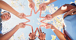 Nature, circle and people with star hands for support, solidarity and trust in non profit organization. Bonding, low angle and group of volunteers with fingers together for connection in ngo at park.