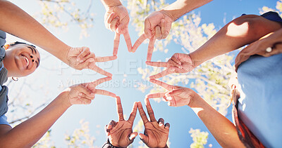 Buy stock photo Nature, circle and people with star hands for support, solidarity and trust in non profit organization. Bonding, low angle and group of volunteers with fingers together for connection in ngo at park.