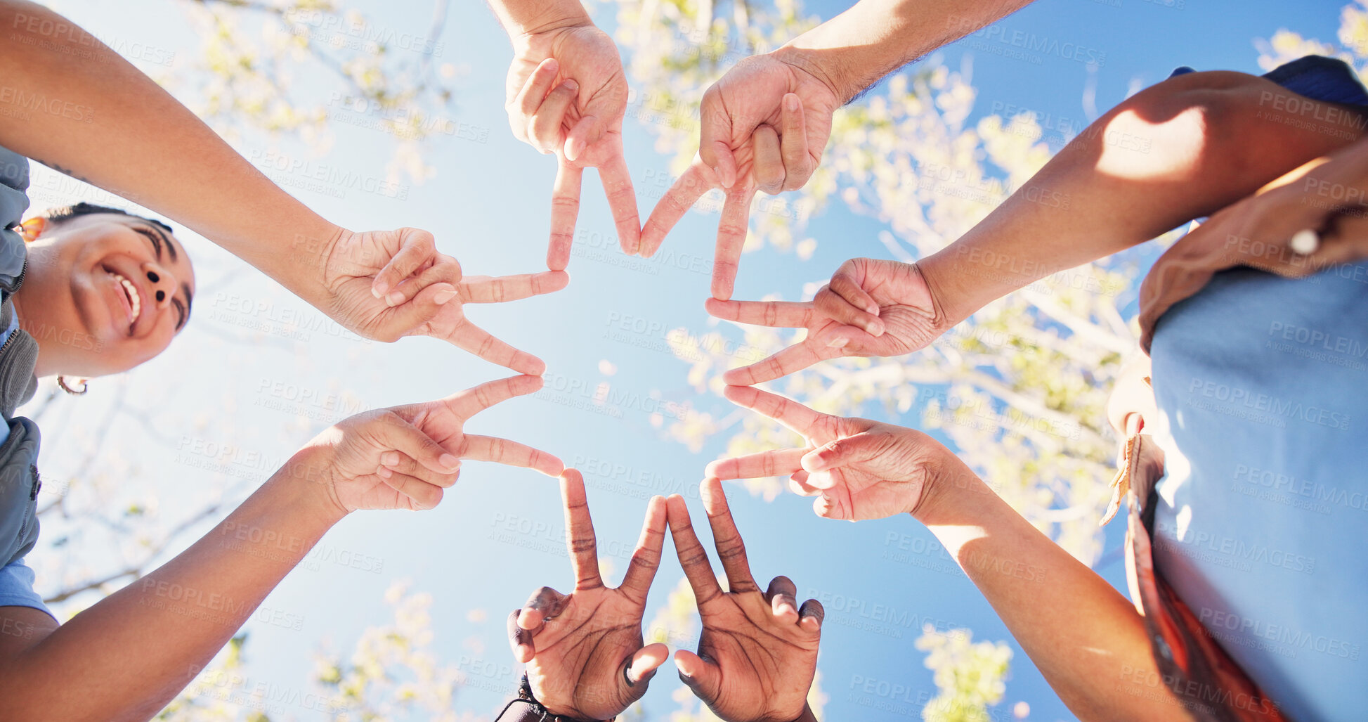 Buy stock photo Nature, circle and people with star hands for support, solidarity and trust in non profit organization. Bonding, low angle and group of volunteers with fingers together for connection in ngo at park.