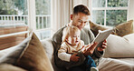 Dad, boy and relax with tablet on couch for elearning video, bonding and smile in living room. Man, father and child with tech, movies and streaming subscription with funny cartoon in family house