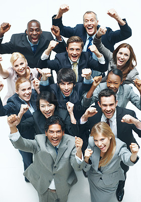 Buy stock photo Portrait, cheering and excited business people in studio with smile, achievement and success for profit. Above, happy team and celebration with corporate deal, revenue and bonus on white background.