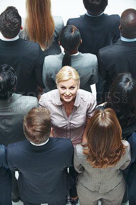 Buy stock photo Business, selection and portrait with happy woman in crowd for job opportunity or talent above. Top view, female person or employee with smile in audience for pick, recruitment process or identity