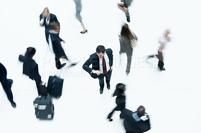 Buy stock photo Travel, businessman and check time at airport for trip schedule, above or motion blur with fast crowd. Watch, flight or person with urgency, commute or rush with delay for international journey