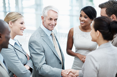 Buy stock photo Happy, staff or handshake with manager in office for department welcome, respect or work culture. People, mature man and shaking hands with new hire for business intern, team integration and growth