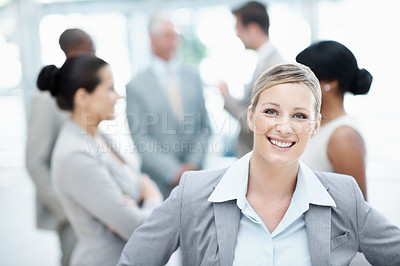 Buy stock photo Corporate, portrait and business woman in lobby with team for financial agency, career and opportunity. Office, colleagues and person for about us, company pride and ambition for finance consulting