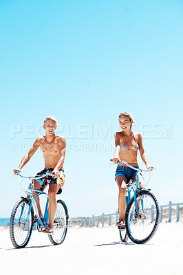 Buy stock photo Cycling, happy and portrait with couple at beach for romantic date, summer vacation and bonding. Love, support and adventure with man and woman on bicycle outdoor for journey, freedom and space