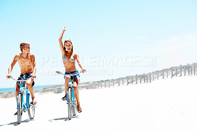 Buy stock photo Cycling, excited and travel with couple at beach for romantic date, summer vacation and bonding. Love, support and adventure with man and woman on bicycle outdoor for journey, freedom and space