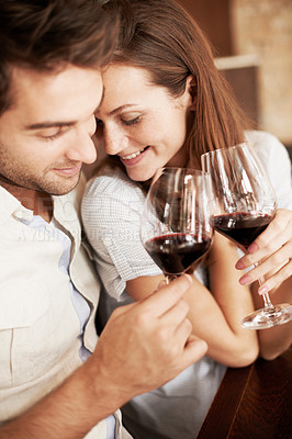 Buy stock photo Couple, love and cheers in restaurant with wine, relationship milestone and smile for commitment goals. People, romantic date and toast with alcohol drink for celebration, care and happy for loyalty.