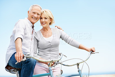Buy stock photo Cycling, portrait and senior couple with bicycle, love and bonding with partner and travel together. Happy, old people and trip with eco friendly transport, space and connection with spouse in nature