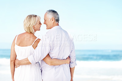 Buy stock photo Holiday, love or elderly couple at beach with embrace, happy moment or connection on summer trip. Space, back or senior people with hug, romantic relationship or bonding together on outdoor getaway.