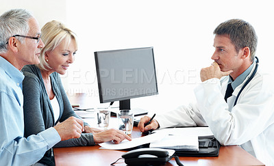 Buy stock photo Doctor, results and consultation with old couple, healthcare or patient history on white background. Medical worker, people and talking in studio with paperwork, retirement or happy with recovery