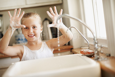 Buy stock photo Wellness, happy child and handwashing with soap in portrait for dirt removal, independence and pride. Development, kid and foam in house for bacteria prevention, sanitation and learning healthy habit