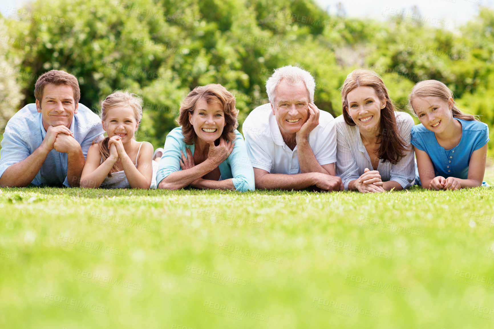 Buy stock photo Portrait, family and parents in park with kids, relax together or generations bonding on weekend break. Space, happy mature people and grandma outdoor on grass with grandfather, children or wellness.