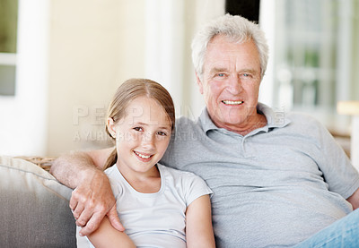 Buy stock photo Portrait, smile and grandfather with child on sofa in home for bonding, support and connection. Love, family visit and weekend break with senior man and kid in apartment for trust, happy and care