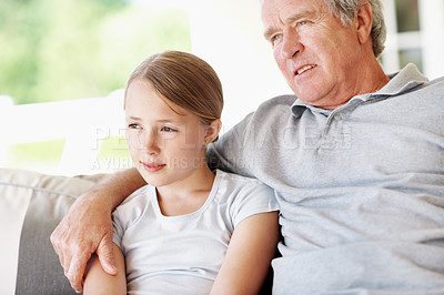 Buy stock photo Relax, thinking and grandfather with child on sofa in home for bonding, support and connection. Love, family visit and weekend break with senior man and kid in apartment for trust, vision and care