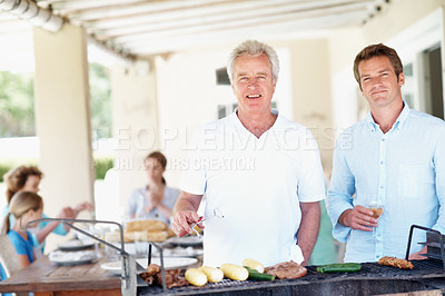 Buy stock photo Barbecue, portrait and senior father with man in home for cooking, smile and family celebration. Bbq reunion, summer vacation and grill with people in backyard of house for weekend break and support