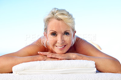 Buy stock photo Happy, relax and woman at spa retreat for treatment on holiday, getaway or weekend trip with calm. Smile, space and mature person with self care for zen, health and wellness on peaceful vacation.