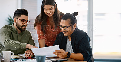 Buy stock photo Shot of a group of young businesspeople having a meeting in a modern office