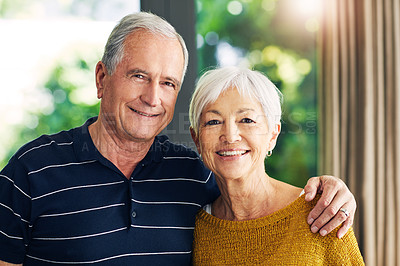 Buy stock photo Shot of a happy senior couple spending time together at home