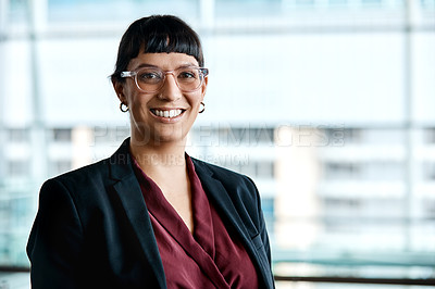 Buy stock photo Cropped portrait of an attractive businesswoman standing in her office
