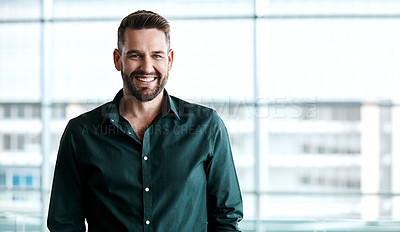 Buy stock photo Cropped portrait of a handsome businessman standing in his office