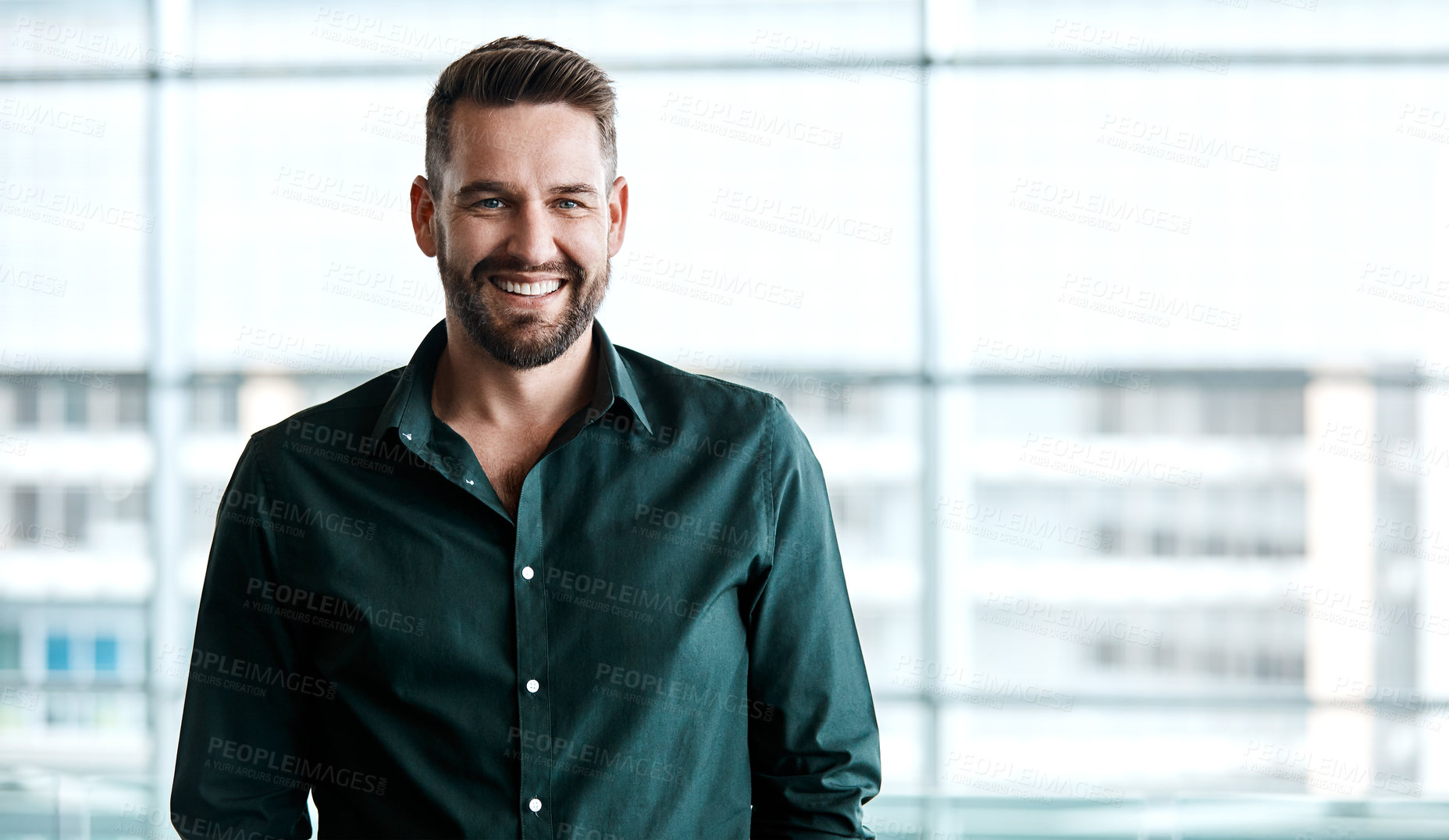 Buy stock photo Cropped portrait of a handsome businessman standing in his office