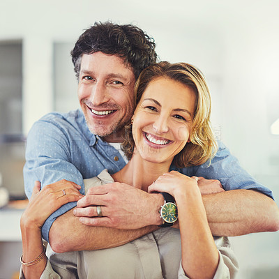 Buy stock photo Portrait of an affectionate mature couple spending quality time at home