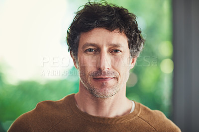 Buy stock photo Portrait of a confident mature man standing in his home