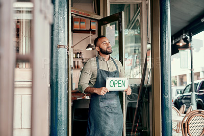 Buy stock photo Shot of a young man holding an 