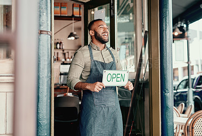 Buy stock photo Shot of a young man holding an 