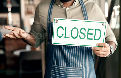 Buy stock photo Closeup shot of an unrecognisable man shrugging while holding a 
