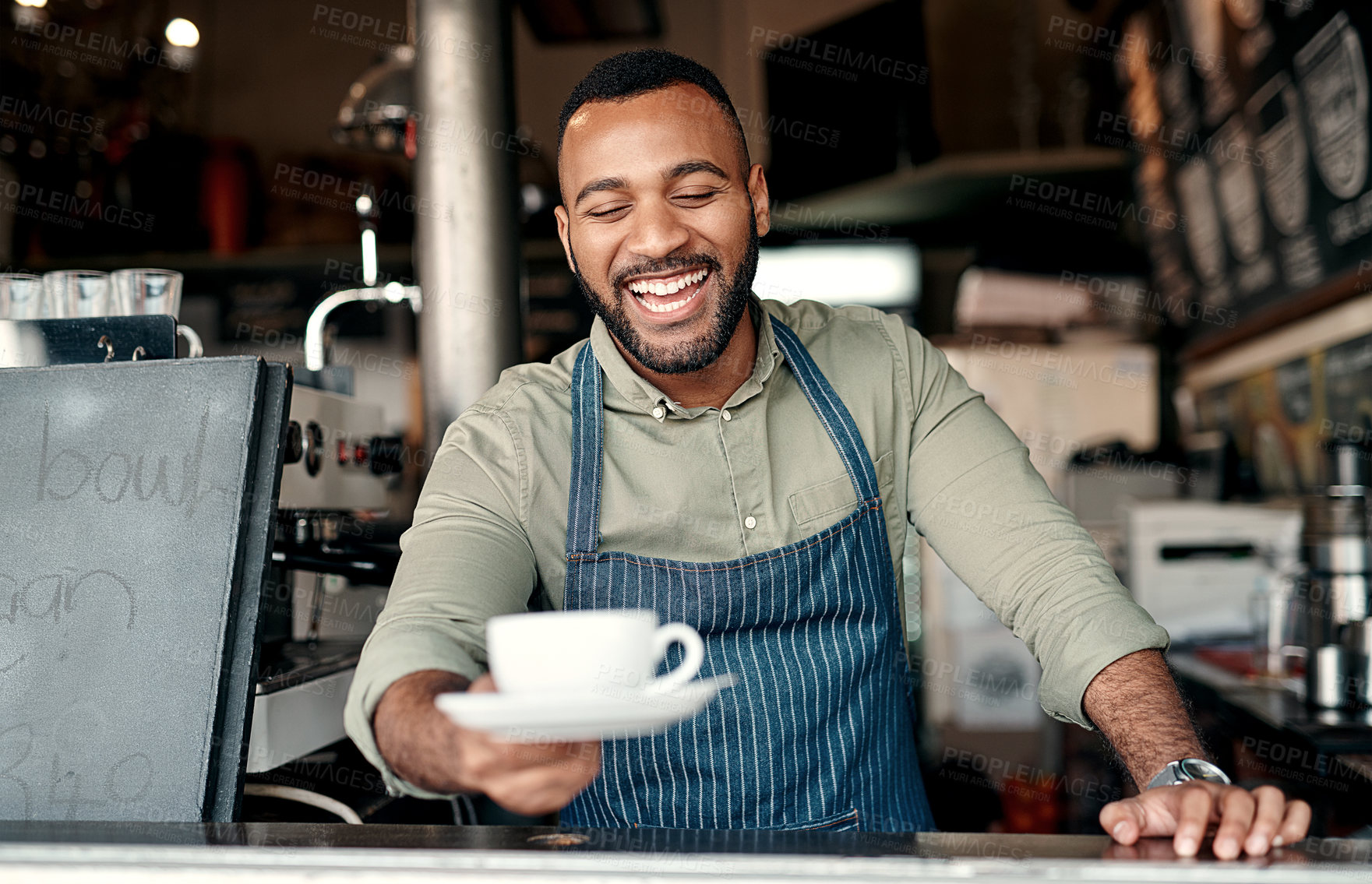 Buy stock photo Shot of a barista serving coffee in a cafe