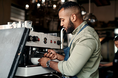 Buy stock photo Shot of a barista preparing coffee in a cafe