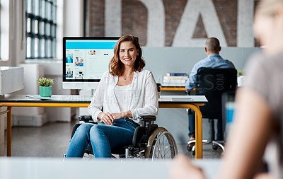 Buy stock photo Portrait of a young businesswoman in a wheelchair working in an office