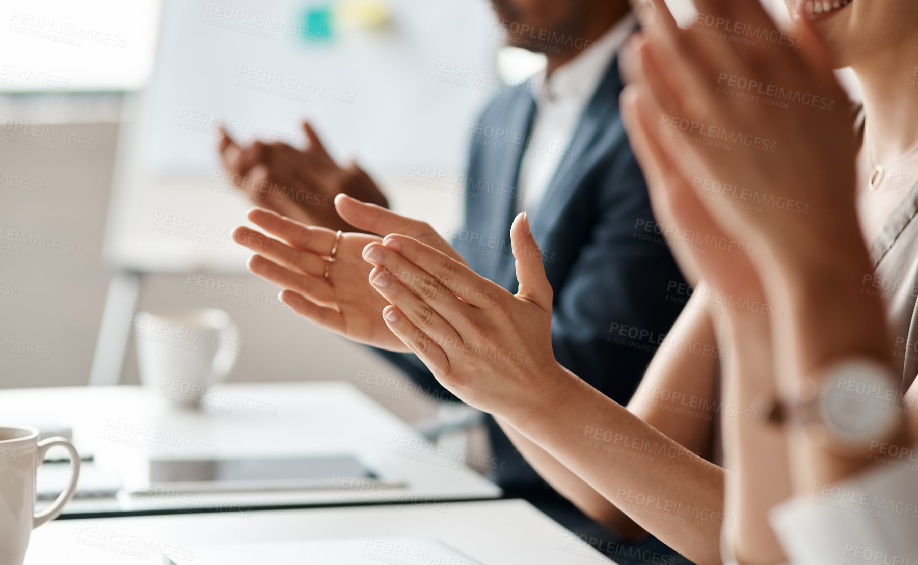 Buy stock photo Closeup shot of a group of businesspeople applauding during a meeting in an office