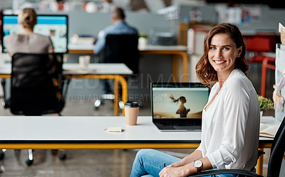 Buy stock photo Portrait of a confident young businesswoman working in an office