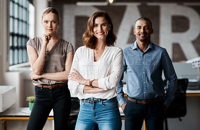 Buy stock photo Portrait of a group of businesspeople standing together in an office