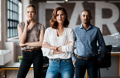 Buy stock photo Portrait of a group of businesspeople standing together in an office