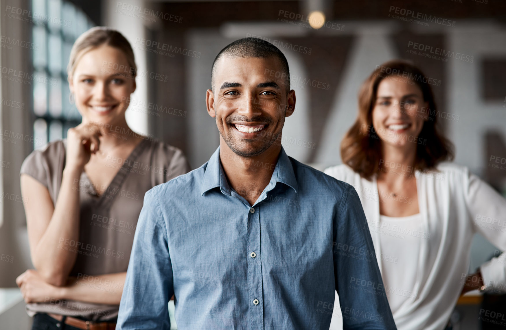 Buy stock photo Portrait of a group of businesspeople standing together in an office